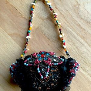 Sasha handmade small black beaded purse with lace and shells.